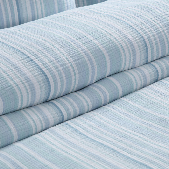 Boracay Stripe Muslin Comforter Set featuring soft aqua and white striped cotton texture.