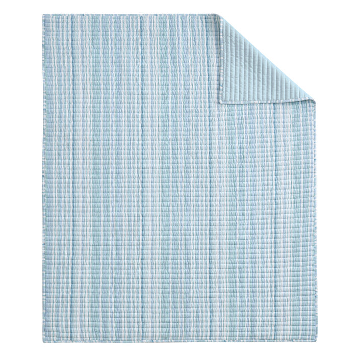 Boracay Stripe Muslin Quilted Throw featuring soft aqua and sky blue stripes, lightly quilted for added texture.