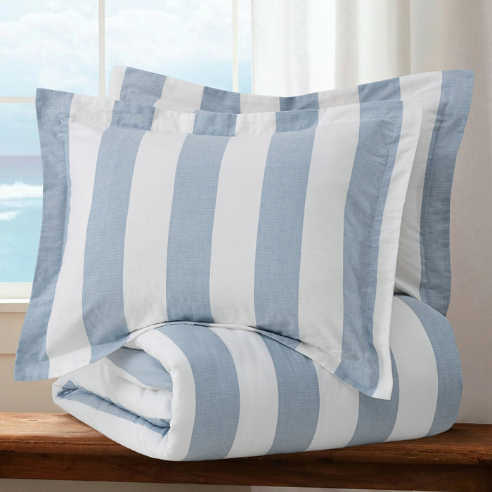 Cabana Woven Stripe Comforter Set featuring bold vertical stripes in coastal blue and white on a cozy bedding display.