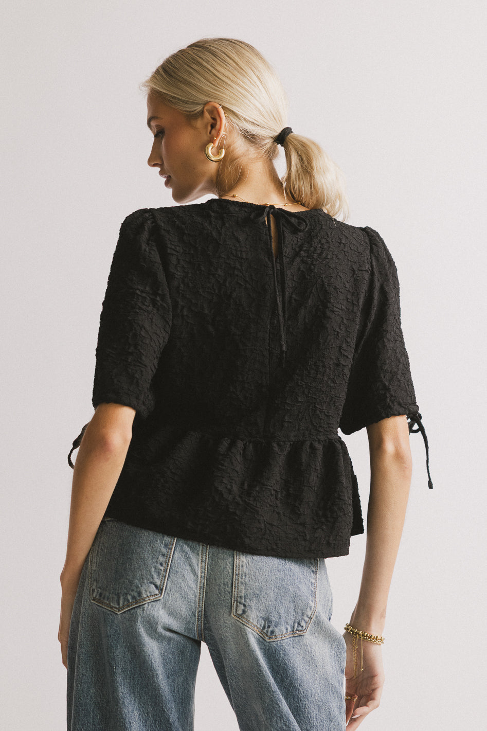 Alessia Peplum Top in Black