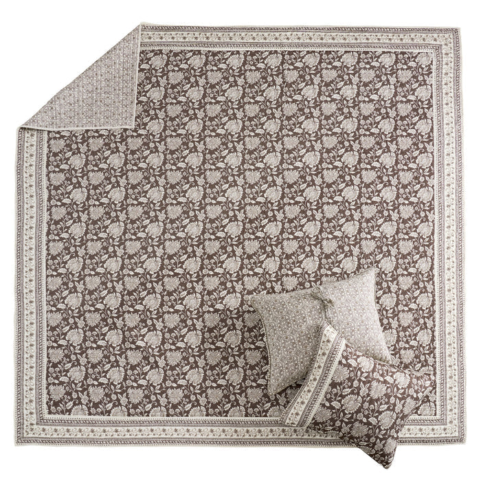 Adare Cocoa Quilt Set featuring a reversible quilt with bordered batik floral print and cocoa color, 100% cotton fabric.