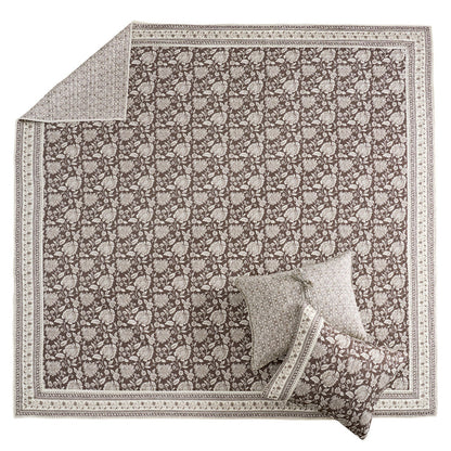 Adare Cocoa Quilt Set featuring a reversible quilt with bordered batik floral print and cocoa color, 100% cotton fabric.