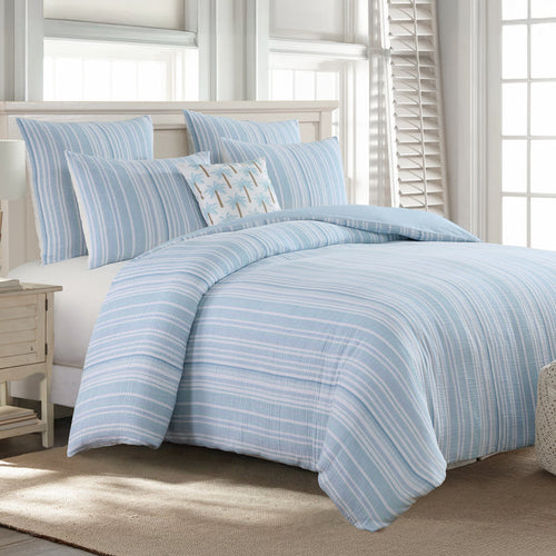 Boracay Stripe Muslin Comforter Set in soothing aqua and white tones displayed on a bed with styled pillows.