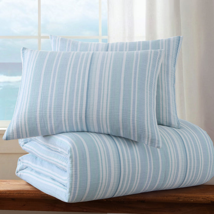 Boracay Stripe Muslin Comforter Set featuring a soft aqua and white striped comforter and pillow shams.