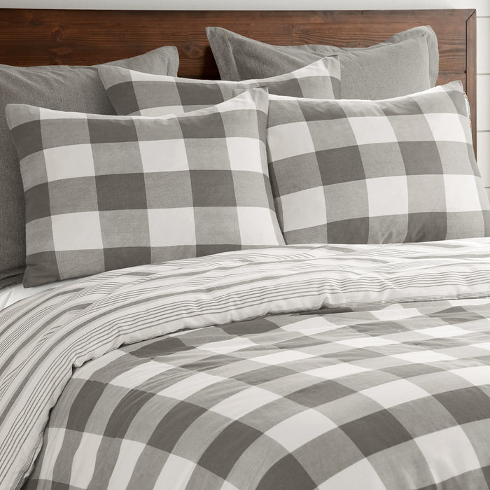 Camden Comforter Set featuring buffalo check pattern with coordinating striped pillowcases.