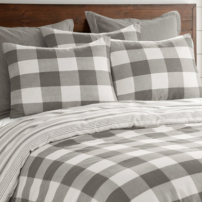 Camden Comforter Set featuring buffalo check pattern with coordinating striped pillowcases.