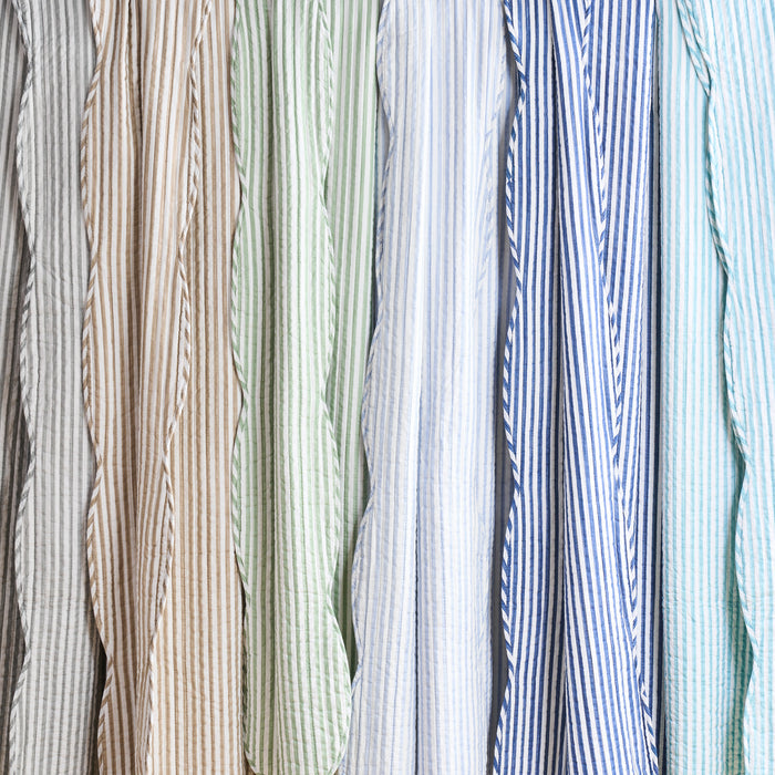 Collection of striped fabric swatches in various colors.