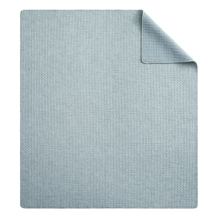 Pick-Stitch Artisan Quilted Throw in soft blue with textured quilted surface and reversed cotton backing.