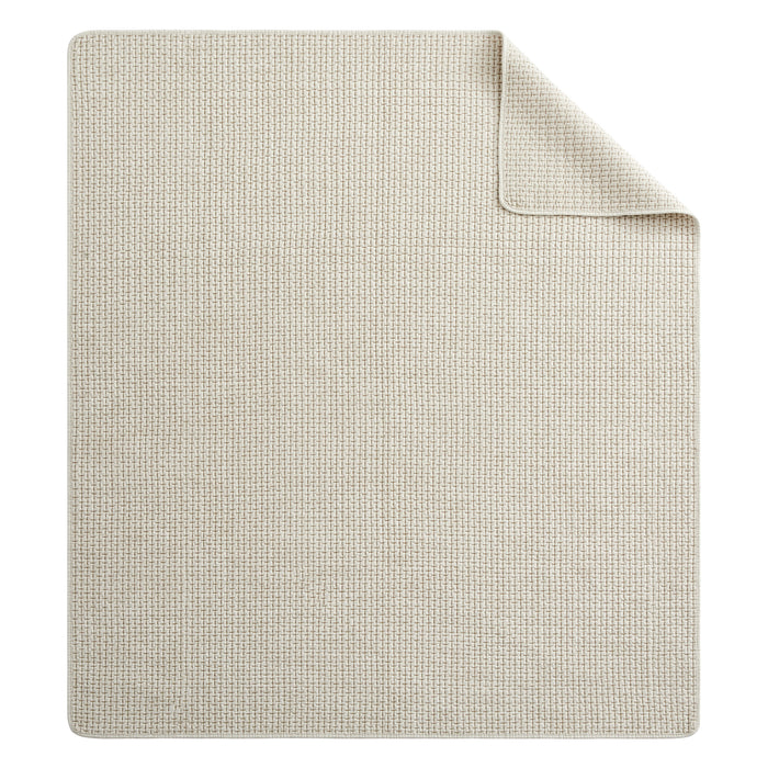 Pick-Stitch Artisan Quilted Throw in a light, textured fabric, showcasing the reversible design and pick-stitch detailing.