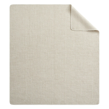 Pick-Stitch Artisan Quilted Throw in a light, textured fabric, showcasing the reversible design and pick-stitch detailing.