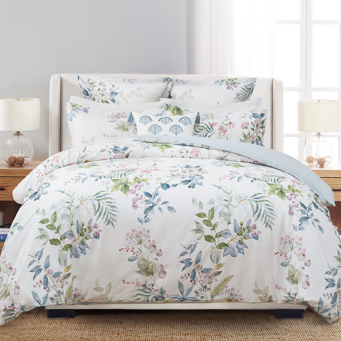 Seraphine Blooms Comforter Set featuring a floral design on smooth cotton sateen for a romantic bedroom style.