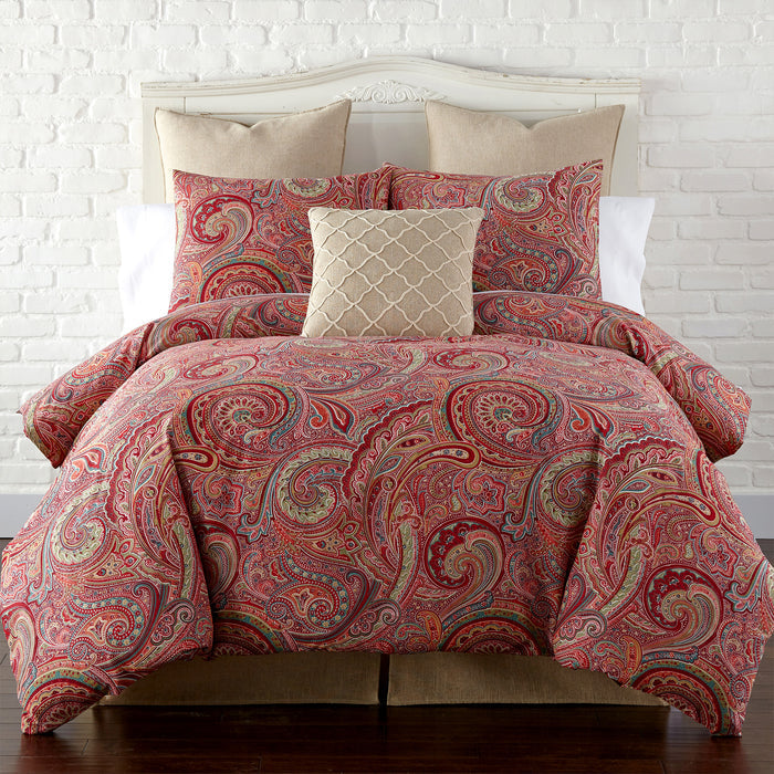 Spruce Comforter Set featuring a rich paisley print in red and gold, designed for elegance and comfort in any bedroom.